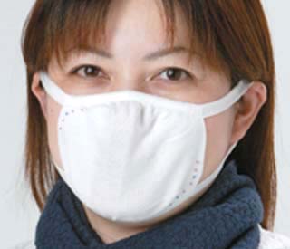 Woman wearing surgical face mask