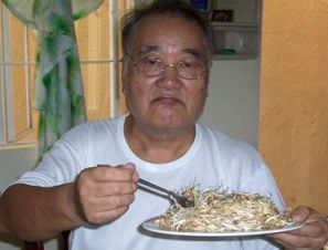 Mr. Takano eating Sprouts