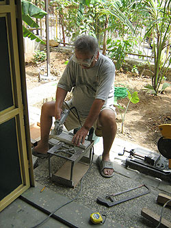 Mr. Takano making stove