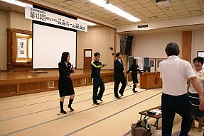Schoolchildren doing takefumi