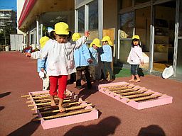 Schoolchildren doing takefumi