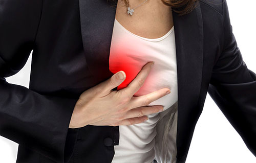 Woman having a chest pain