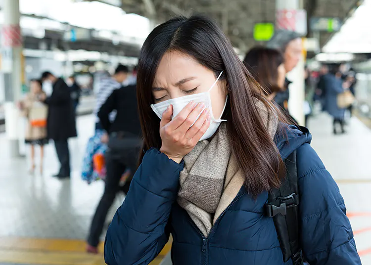 Asian Woman Coughing